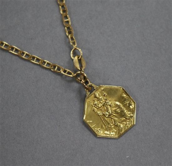 A yellow metal St. Christophers pendant on an 18ct gold chain.